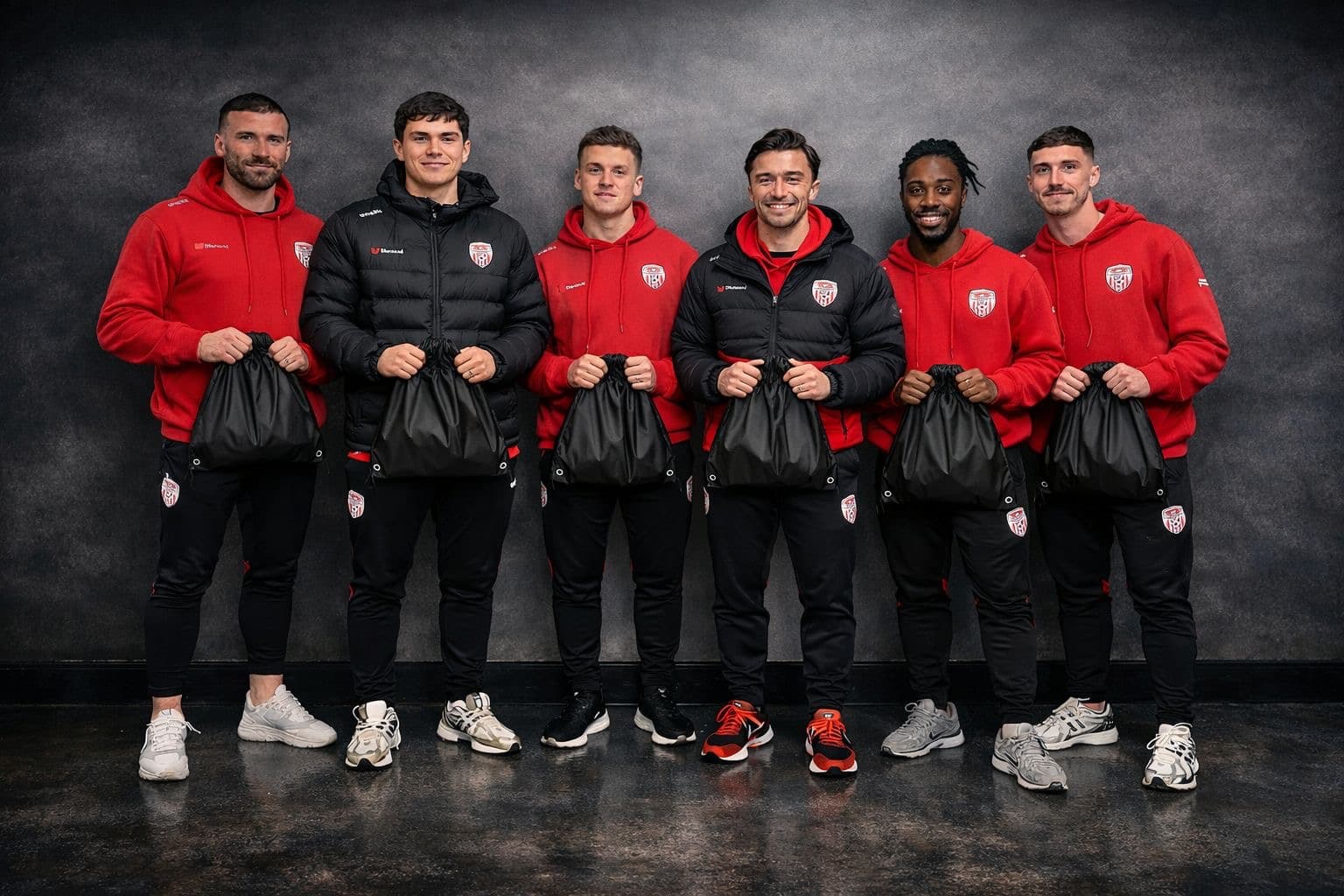 Derry City athletes with Athletes 5in1 matchday packs